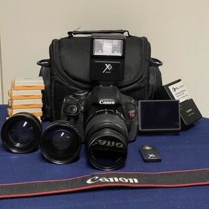 Canon T3i bundle + 7 batteries.